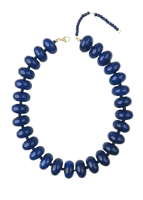 Blue beaded necklace on a white background