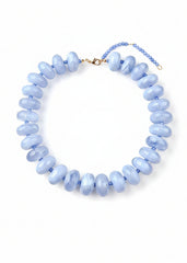 Necklace with light blue beads on a white background