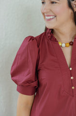 The Ginny Merlot Ruffle Hem Midi Dress