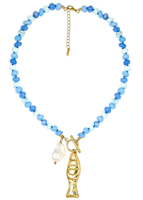 Necklace with blue beads and gold fish charm on a white background
