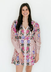 Woman wearing a floral dress on a white background