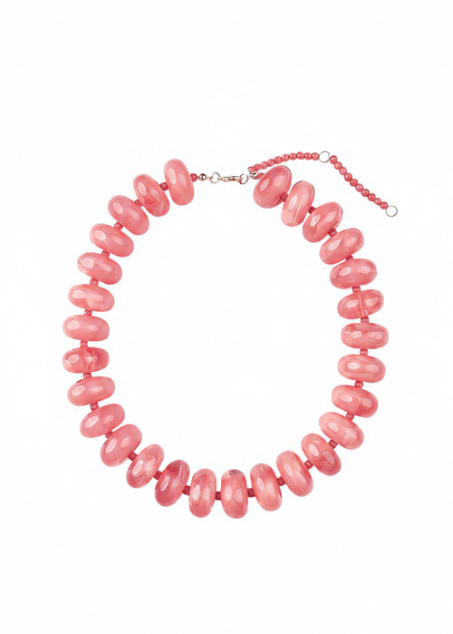 Necklace with pink beads on a white background